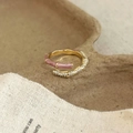 Detail of bamboo-shaped gold ring featuring pink enamel and micro-set zircon stones - Purple