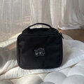 Black nylon portable makeup bag with cute cartoon patch and sturdy handle for travel - Black