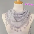 Elegant light grey lace triangle scarf featuring rose patterns and tassel edges - Grey