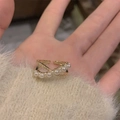 Elegant gold-tone adjustable cross ring featuring small white pearls in a hand display - Multi-pearl X Micro-set Zircon Cross Style / Gold