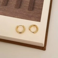 Close-up of minimalist 18K gold-plated geometric hoop earrings on a neutral background - Gold Hoop Earrings (A-226)