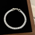 Close-up of rectangular cut zircon tennis bracelet in a black velvet jewelry box - D-280 Silver Large White Zircon Bracelet