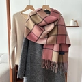 Classic plaid winter scarf with pink and brown tassels on a coat hanger setup - 54x205cm / Pink