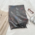 Thick grey knitted scarf with colorful abstract feather patterns and fringe details - Black