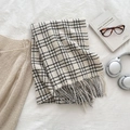Plaid winter scarf in beige and black with fringe details and soft texture - White