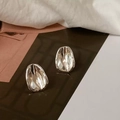 Macro shot of silver liquid metal irregular earrings on a minimalist chic background - Liquid Metal Flow Studs / Silver (Small Size)