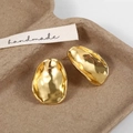 French retro gold irregular geometric stud earrings with hammered texture on paper tray - Hammered Irregular Ellipse Studs / Gold (Large Size)