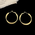 Detailed view of triple-layered gold hoop earrings with textured metallic finish - 3CM Diameter / Gold 3cm