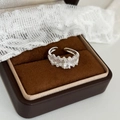 Close-up of elegant crown ring with oval zircon set on dark velvet jewelry box - Silver with White Zirconia