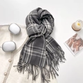 Dark gray and white checkered scarf with tassels styled on a white cardigan - 65-180CM / Gray