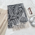 Women's paisley print shawl in black and white with decorative tassels and fringes - Black