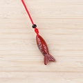 Red jasper fish pendant with carved scales on a red woven cord necklace - Red Jasper