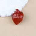 Red jasper hand-carved anatomical heart sculpture with polished natural stone texture - Red Jasper