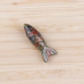 Fish-shaped pendant carved from natural Unakite stone with green and red textures - Unakite