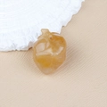 Polished yellow amber crystal heart stone carving ornament with natural textures - Topaz