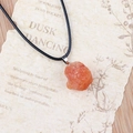 Natural orange raw stone pendant necklace with black cord and rustic mineral texture - Red Agate