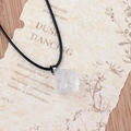 Irregular natural clear quartz crystal pendant on a minimalist black woven cord necklace - White Crystal