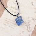 Blue raw natural stone pendant necklace with irregular texture on vintage paper - Lapis Lazuli