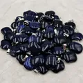 Close-up of blue sandstone apple pendants with sparkling starry texture and silver clasp - Blue Sandstone (Synthetic)