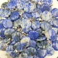 Bulk display of round blue and white marbled stone pendants with silver clasps - Blue Spot Jasper