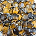 Detailansicht von Sternanhängern aus Tigerauge-Naturstein mit Metallösen - Tigerauge 1 Stück