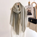 Detail of sage green lightweight scarf with fringe edges and soft cashmere texture - 90*180cm / Grey Green