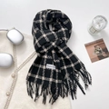 Black and white checkered cashmere scarf with fringe details in a minimalist setting - 65-180CM / Black