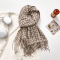 Elegant beige and brown plaid scarf with tassels and aesthetic lifestyle props - Oatmeal