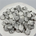 White turquoise apple shaped stone pendants with natural grey marble textures and metal bails - Howlite