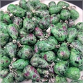 Close-up of teardrop-shaped natural ruby in zoisite pendants with metal clasps - Ruby in Zoisite (Synthetic)
