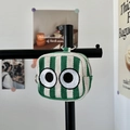 Mini green striped canvas pouch with embroidered eyes and silver keychain hook - Green