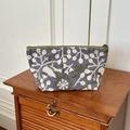 Blue canvas pouch with bird embroidery and green zipper for cosmetic storage - Gray
