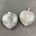 Translucent clear quartz heart pendant with silver bail and natural stone texture - Phantom Quartz