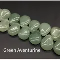 Macro detail of teardrop Green Aventurine stone beads showing polished texture - 13x18mm Green Aventurine