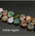Macro view of polished teardrop Indian Agate stones showing natural textures and colors - 13x18mm Indian Agate