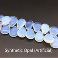 Dettaglio macro di perle in opale sintetico blu a forma di goccia per gioielli - 13x18mm Opale (Sintetico)