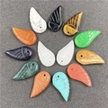 Macro view of multi-color carved angel wing pendants for DIY bracelet making - Mixed Random