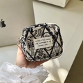 Embroidered canvas mini organizer bag featuring black fish patterns and metal zipper - Off White