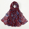 Detail of floral printed burgundy scarf featuring blue and purple petal patterns - Wine Red (4#)