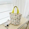 Secchiello trapuntato bianco crema con stampe di cani e manici giallo brillante - Stile Borsa a Mano