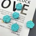 Macro detail of turquoise-colored peony flower pendants with black marble veins for DIY jewelry - Bare Stone Without Loop Style / 1 Piece/Pack / Blue Turquoise (Synthetic)