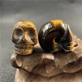 Tiger's Eye carved skull pendants with characteristic golden brown luster for DIY jewelry - Tiger's Eye