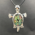 Silver turtle necklace featuring iridescent abalone shell inlay on a black cord - Abalone Shell 1Pc