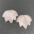 Detailed view of two rose quartz maple leaf pendants with fine carved leaf vein patterns - Rose Quartz 1PC