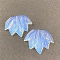 Macro view of maple leaf opalite charms showing delicate carved veins and blue glow - Opalite (1Pc-Synthetic)