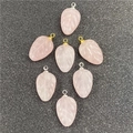 Pink quartz leaf pendants with detailed vein carvings and gold or silver metal loops - Rose Quartz
