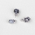 Irregular natural white and black spotted stone pendants with silver-plated metal edges - Moonstone