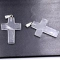 Cross pendant made of translucent natural white crystal with a silver metal clasp - White Crystal