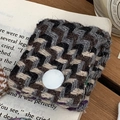 Gray and black chevron knit cable organizer with white snap button on book - Woolen Grey Plaid