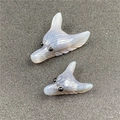 Macro detail of hand-carved wolf head gemstone pendants with intricate fur texture - Grey Agate (Large) / Gray